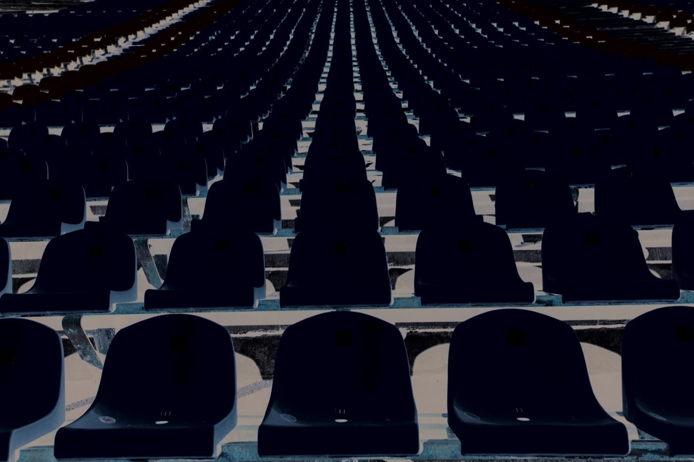 Rows of outdoor plastic stadium seating suited to P45 renovation coating