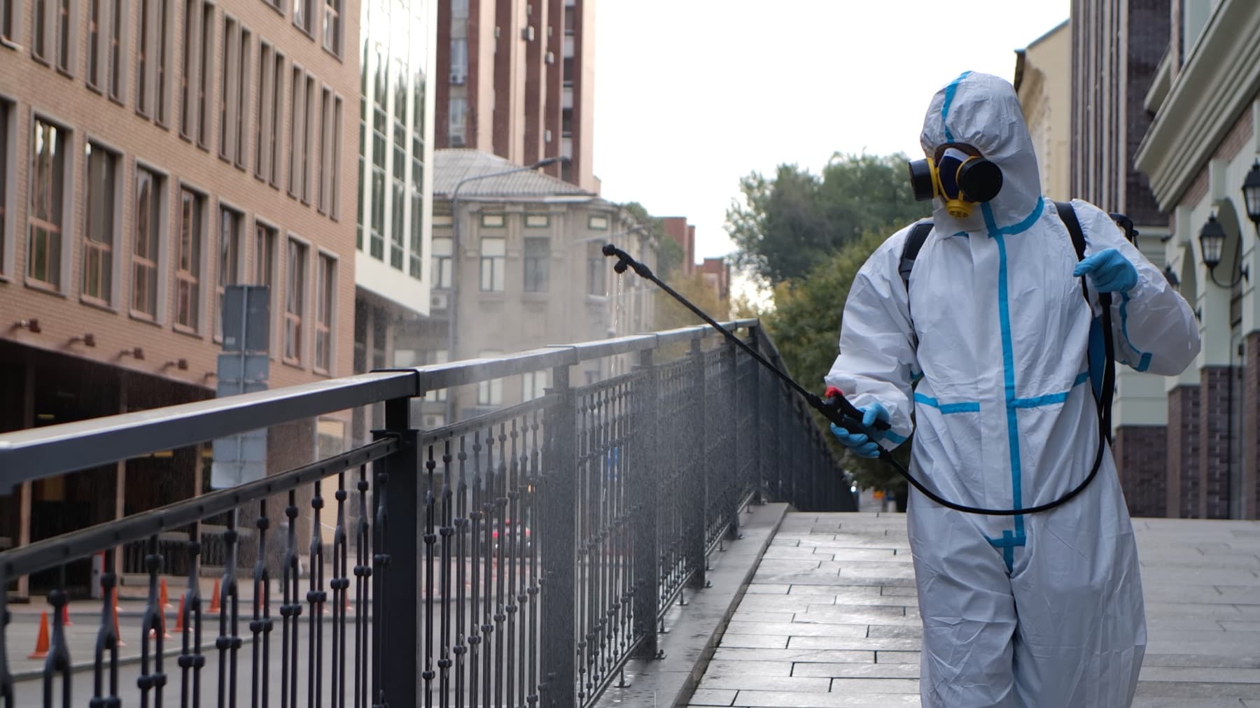 Trained applicator spraying a protective coating