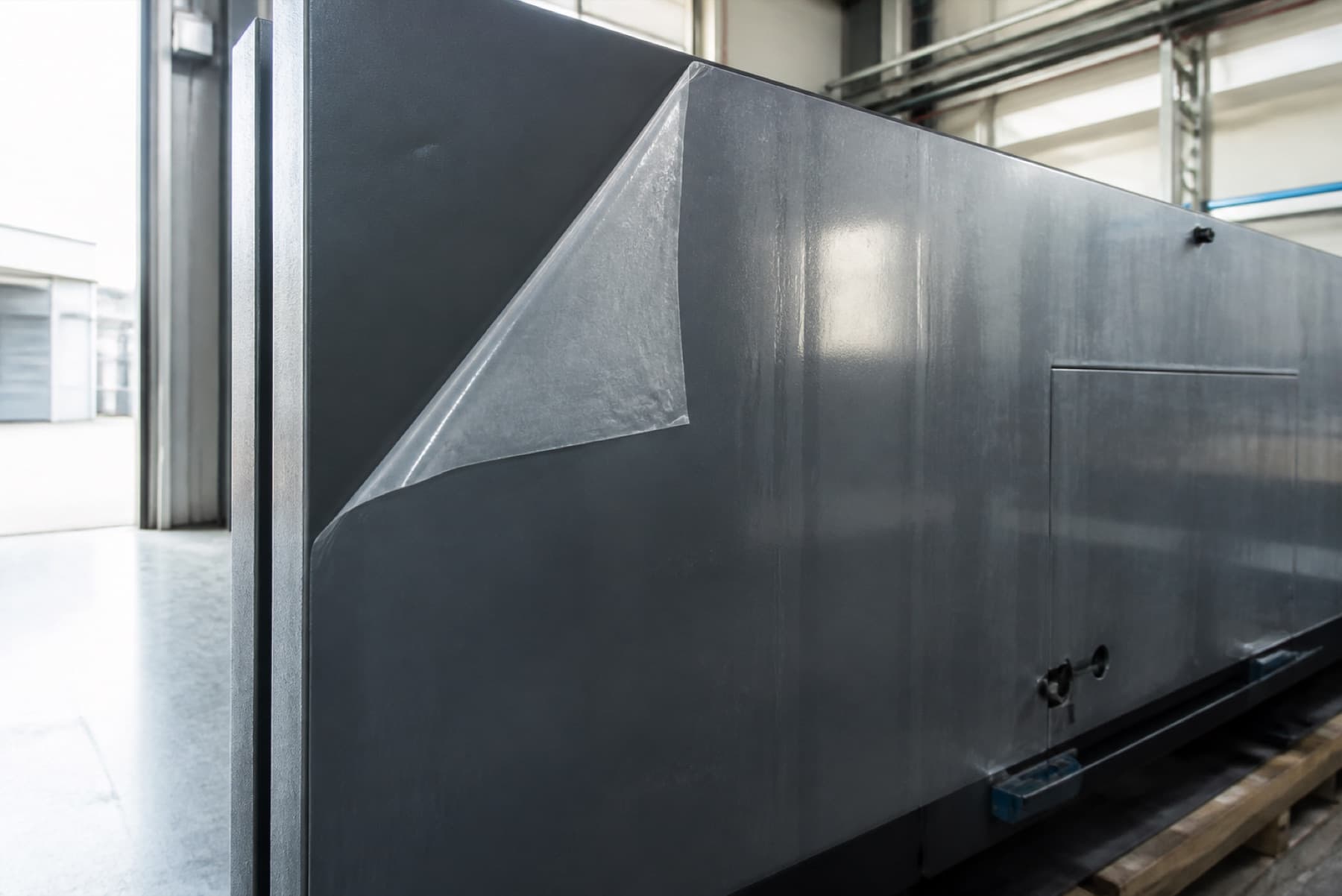 Removable temporary coating on industrial machinery